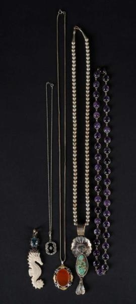 LOT OF 5: ASSORTED NECKLACES.                     