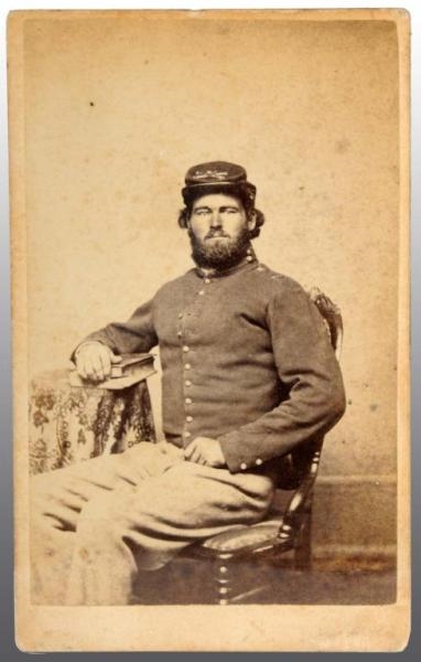 SEATED SOLDIER CDV.                               
