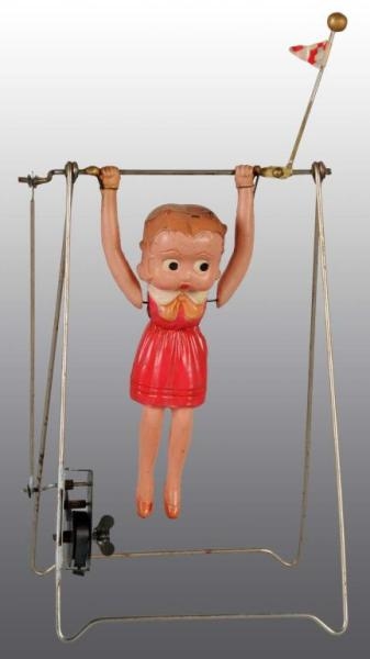 CELLULOID BETTY BOOP SWING WIND-UP TOY.           
