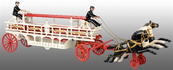 CAST IRON REPRODUCTION FIRE LADDER WAGON TOY.     