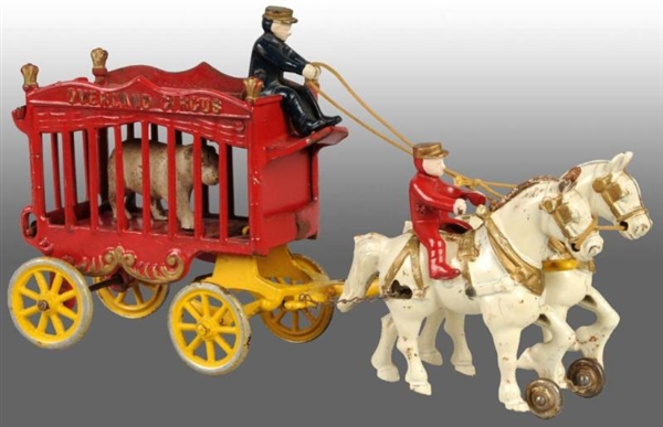 CAST IRON 2-HORSE OVERLAND CIRCUS CAGE WAGON TOY. 