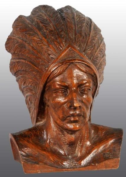 LARGE WOODEN INDIAN CHIEF HEAD CARVING.           