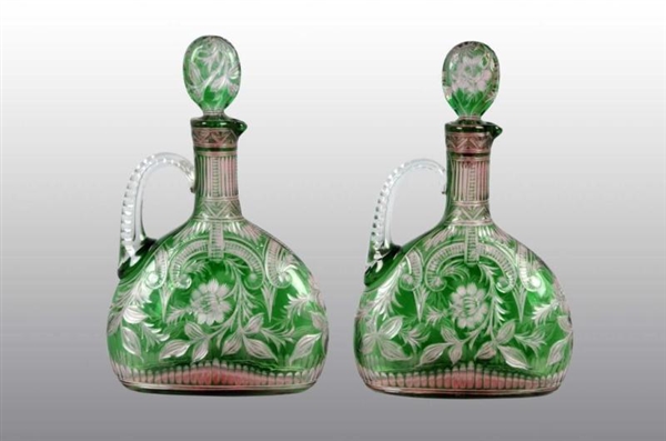 PAIR OF HAND CUT CRYSTAL DECANTERS.               