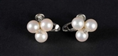 PAIR OF 14K GOLD PEARL EARRINGS WITH DIAMOND CHIP 
