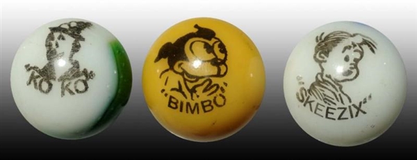LOT OF 3: COMIC MARBLES.                          