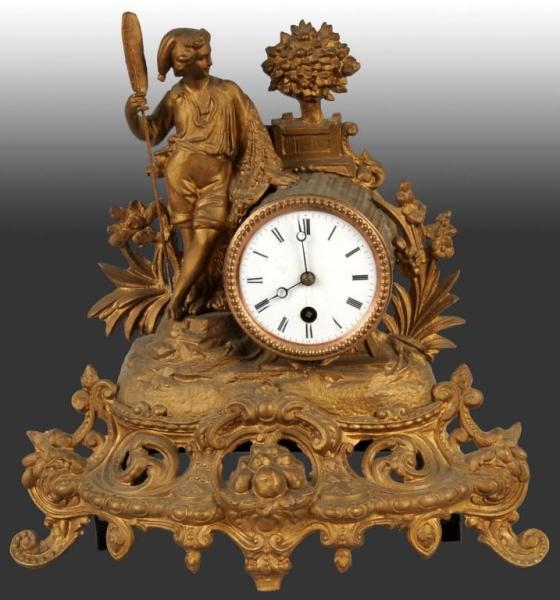 BRASS CLOCK WITH PORCELAIN FACE.                  