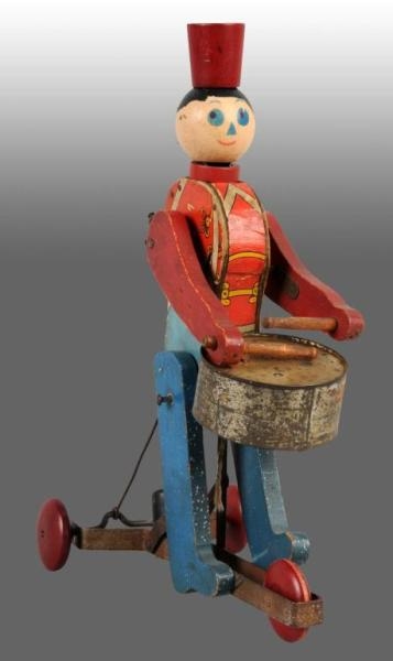 FISHER PRICE NO. 520 PUSHY DRUMMER TOY.           