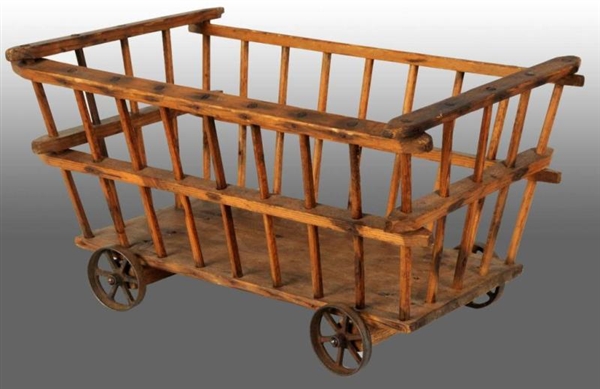 WOODEN HAY CART PULL TOY.                         