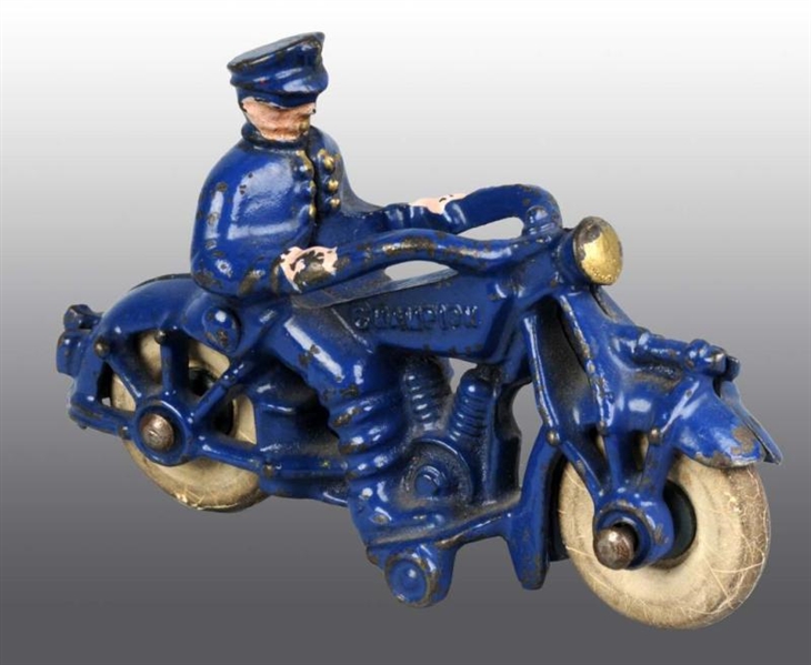 CAST IRON CHAMPION MOTORCYCLE TOY.                