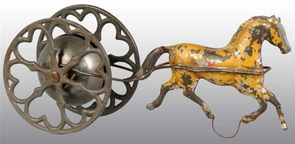 TIN HORSE-DRAWN BELL TOY.                         
