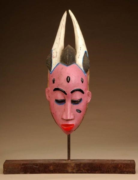 PAIR OF WEST AFRICAN GURO MASKS.                  