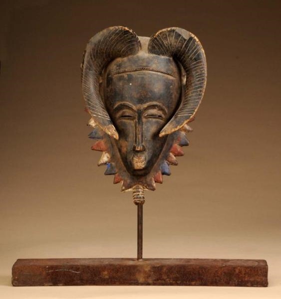 PAIR OF WEST AFRICAN BAOULE MASKS.                