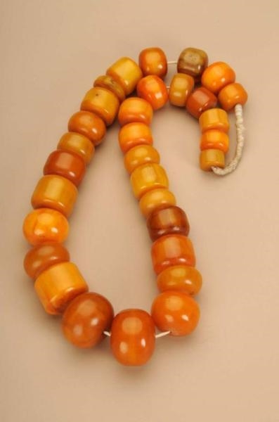 AFRICAN AMBER BEADS.                              