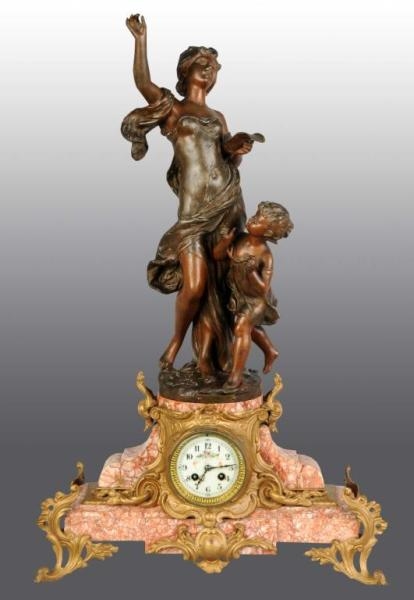 RARE FRENCH PINK MARBLE MANTLE CLOCK.             