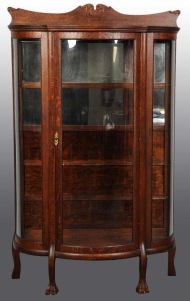 OAK BOW FRONT CHINA CABINET.                      