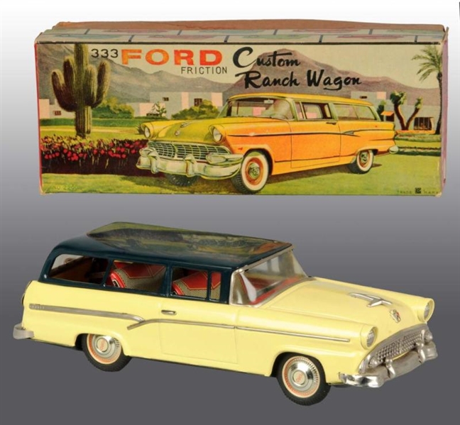 TIN FORD RANCH STATION WAGON FRICTION TOY.        