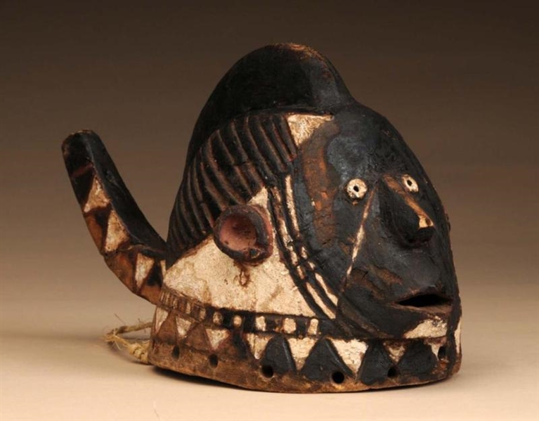SMALL AFRICAN B&W WOODEN FACE MASK W/ TAIL.       