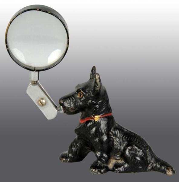 CAST IRON SCOTTIE PAPERWEIGHT & MAGNIFYING GLASS. 