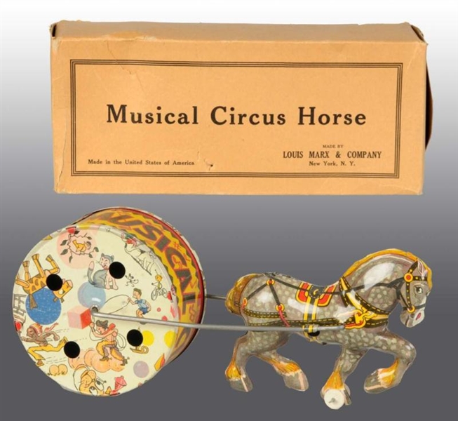 TIN MARX MUSICAL CIRCUS HORSE PULL TOY.           