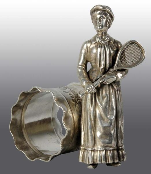 LADY TENNIS PLAYER FIGURAL NAPKIN RING.           