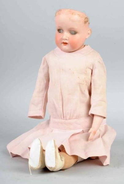 DOLL IN PINK DRESS.                               