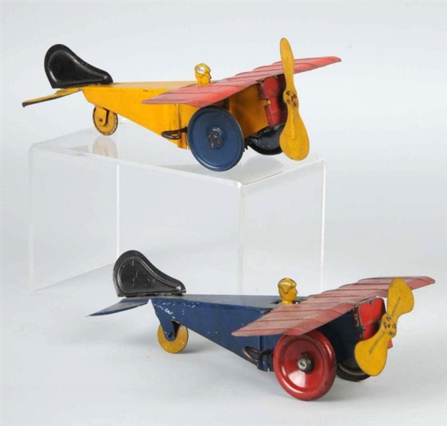 LOT OF 2: TIN AIRPLANE WIND-UP TOYS.              