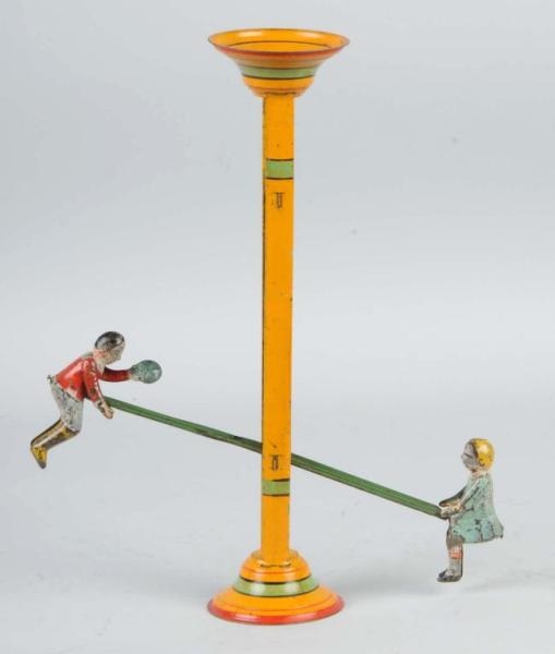 TIN HAND-PAINTED GIBBS SEE-SAW TOY.               