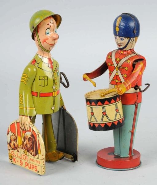 LOT OF 2: TIN CHARACTER WIND-UP TOYS.             