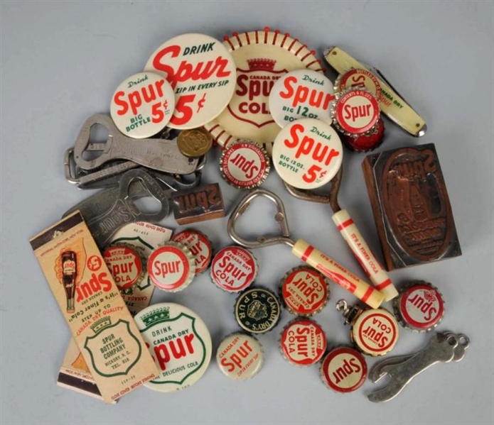 ASSORTED BOX LOT OF SPUR ITEMS.                   