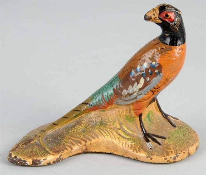 CAST IRON PHEASANT PAPERWEIGHT.                   