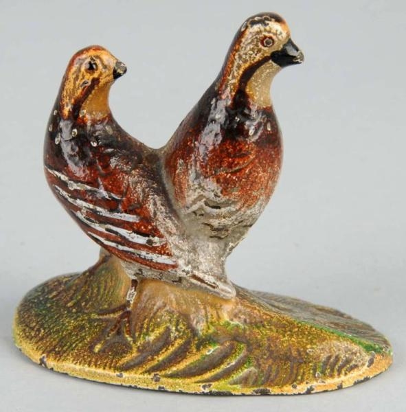 CAST IRON QUAIL PAPERWEIGHT.                      