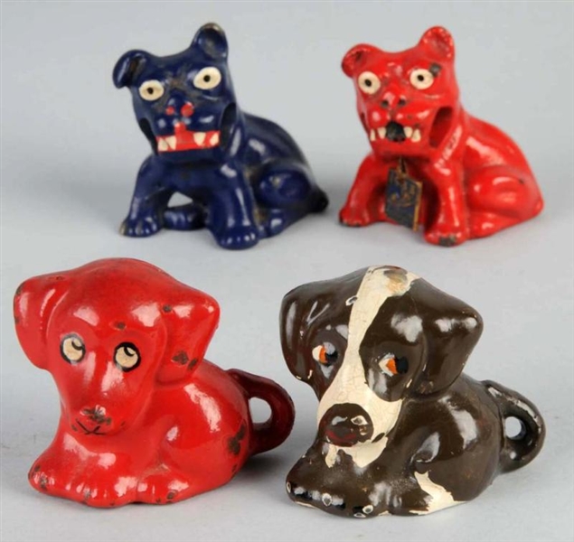 LOT OF 4: CAST IRON DOG PENCIL HOLDERS.           