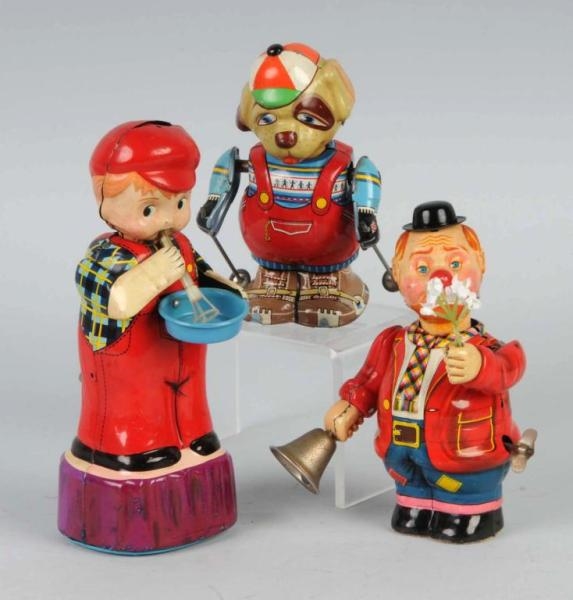 LOT OF 3: TIN FIGURAL WIND-UP TOYS.               