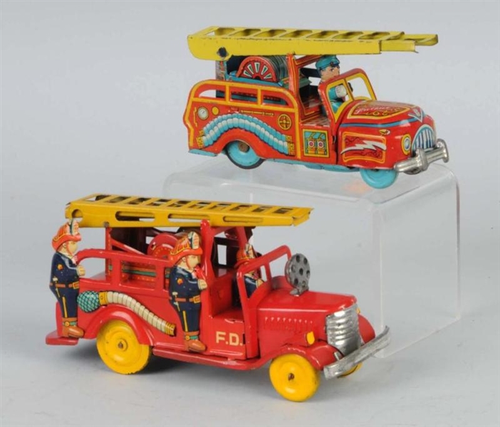 LOT OF 2: TIN FIRE ENGINE FRICTION TOYS.          