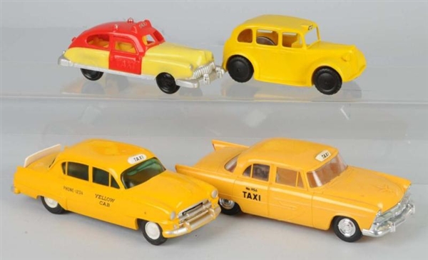 LOT OF 4: PLASTIC TAXI CAB TOYS.                  