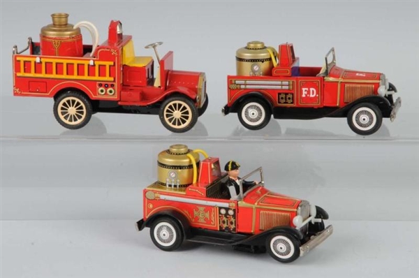 LOT OF 3: TIN FIRE PUMPER FRICTION TOYS.          