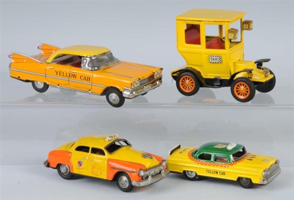 LOT OF 4: TIN TAXI FRICTION TOYS.                 
