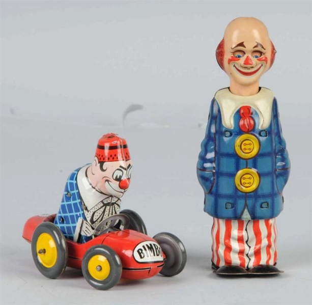LOT OF 2: TIN LITHO CLOWN WIND-UP TOYS.           