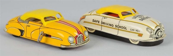 LOT OF 2: TIN MARX AUTOMOBILE WIND-UP TOYS.       