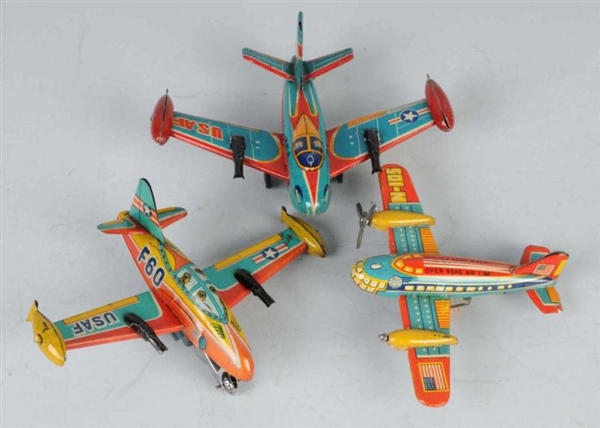 LOT OF 3: TIN AIRPLANE FRICTION TOYS.             