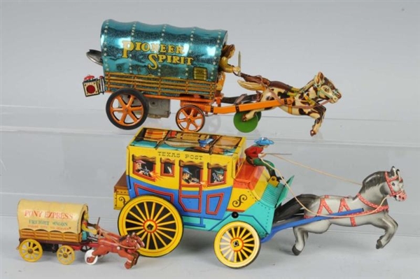 LOT OF 3: TIN STAGE COACH TOYS.                   