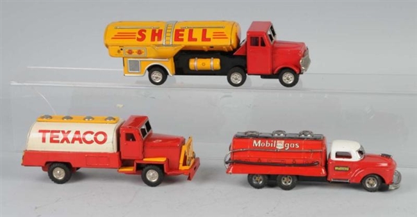 LOT OF 3: TIN LITHO GASOLINE TRUCK FRICTION TOYS. 
