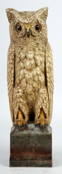 CAST IRON OWL ON PEDESTAL DOORSTOP.               