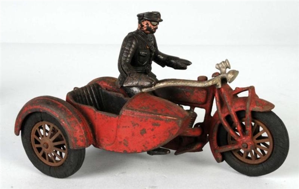 CAST IRON HUBLEY MOTORCYCLE & SIDECAR TOY.        