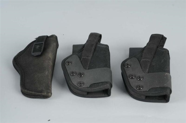 LOT OF 3: RIGHT-HAND BELT HOLSTERS.               