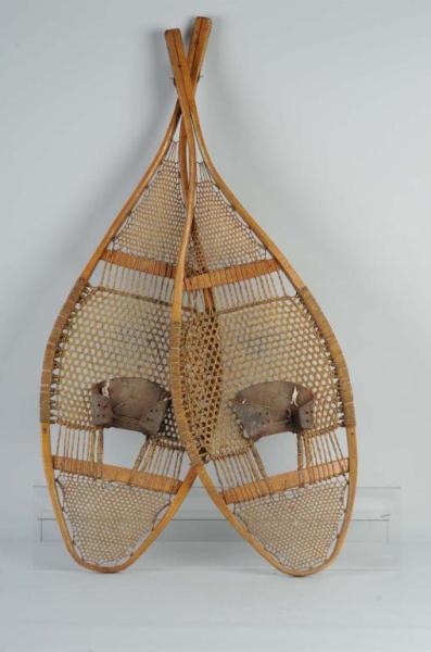 PAIR OF EARLY WOODEN SNOW SHOES.                  