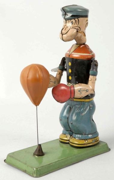 TIN LITHO CHEIN POPEYE FLOOR PUNCHING WIND-UP TOY 