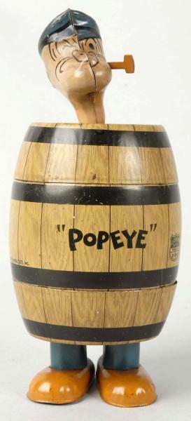 TIN LITHO CHEIN POPEYE IN BARREL WIND-UP TOY.     