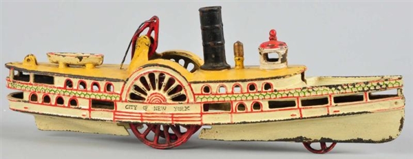 CAST IRON WILKINS PADDLE WHEEL BOAT TOY.          
