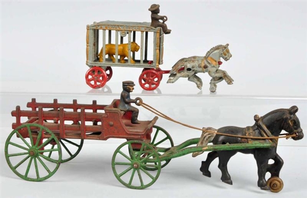 LOT OF 2: CAST IRON HORSE-DRAWN TOYS.             